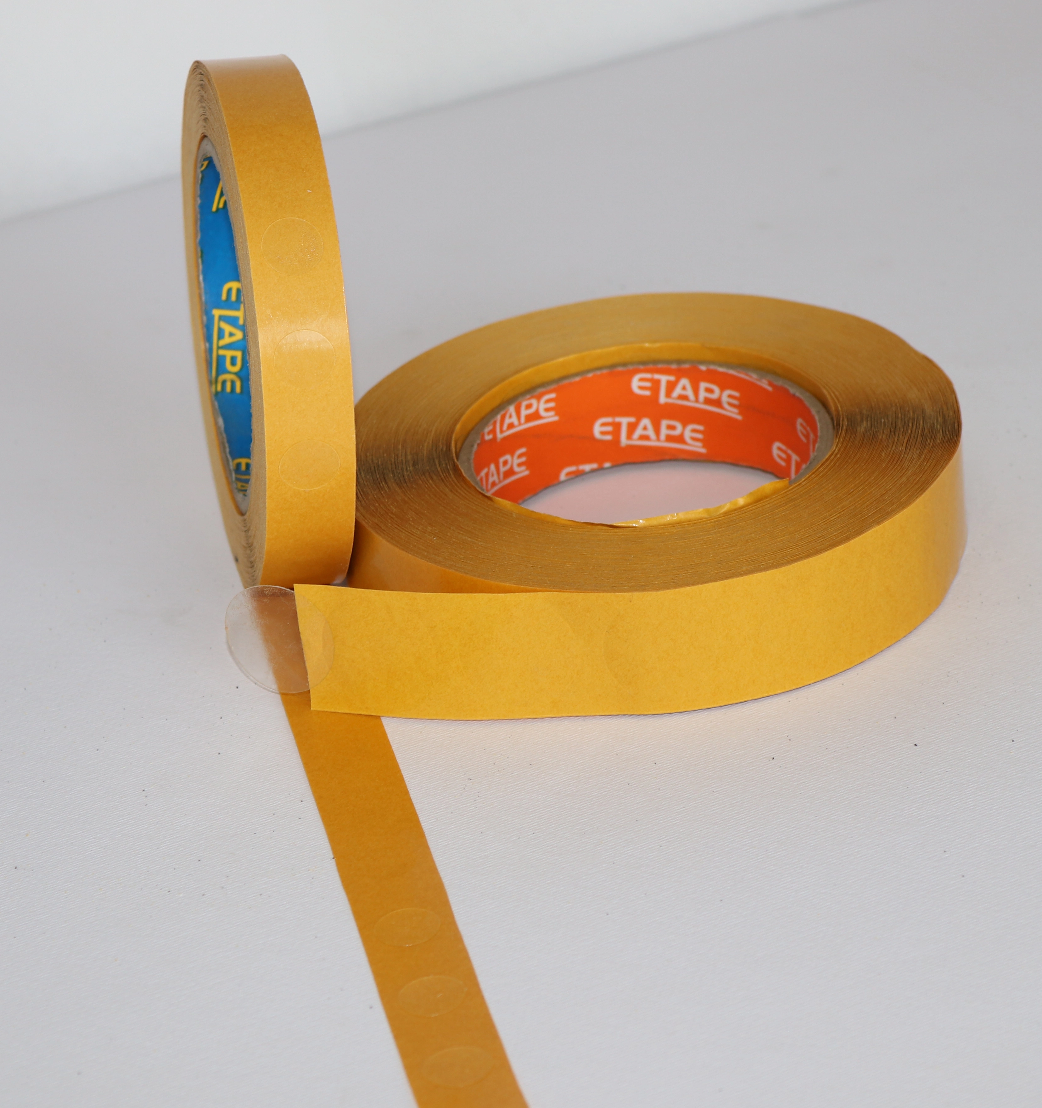 Glue dots used for gluing small things sold by Easitape